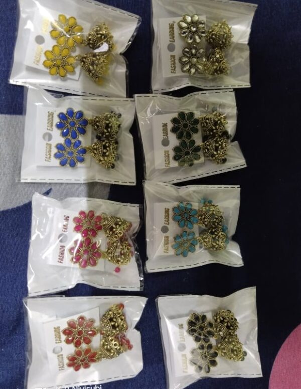 Premium Quality Fency Stones Studed And Goldan Jumkha Earrings (Combo Of 8)